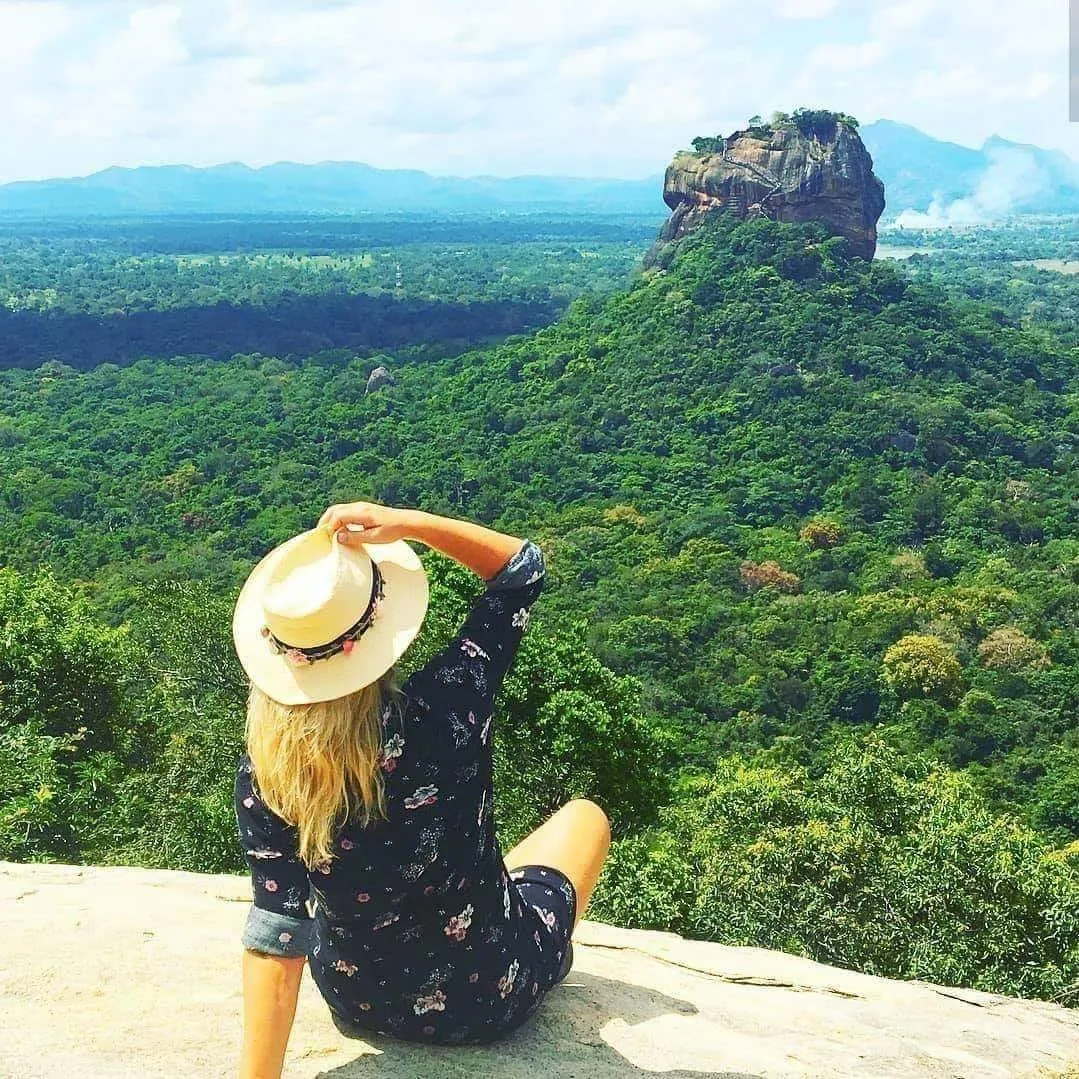 girl in front of  Sigiriya Rock