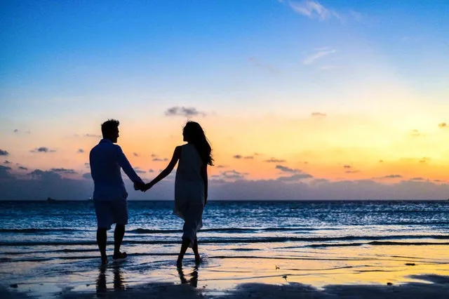 walking couple in Maldives beaches